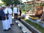 bupati-berau-serahkan-hewan-kurban_20180822_093147.jpg