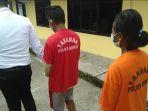 kedua-pelaku-pembunuhan-sadis-saat-digelandang-ke-mapolres-berau.jpg
