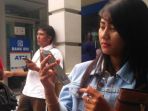 nasabah-usai-melaporkan-berkurangnya-uang_20180313_115108.jpg