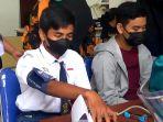 pelaksanaan-vaksinasi-untuk-para-pelajar-yang-telah-berlangsung-di-puskesmas.jpg