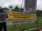 polres-kutim-pasang-spanduk-imbauan_20170301_164519.jpg