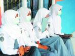 siswa-pakai-masker_20151020_115241.jpg
