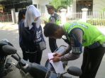 tilang-pengendara_20161121_121352.jpg