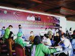 vaksinasi-booster-covid-19-dilaksanakan-secara-massal-di-alun-alun-itho-sendawar.jpg