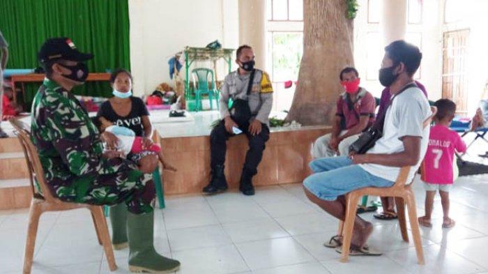 Kompak, Babinsa bersama Bhabinkamtibmas Sosialisasi Prokes Covid-19 Bagi Masyarakat