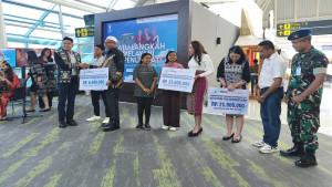 Penyerahan-bantuan-tanggung-jawab-sosial-lingkungan-oleh-Angkasa-Pura.jpg