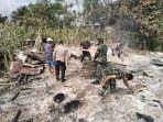 Anggota-TNI-dan-Polri-sedang-bersama-warga.jpg