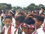 Baca-Puisis-tiga-bahasa-Pecahkan-Rekor-Muri-di-Kabupaten-TTS.jpg