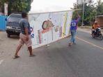 Baliho-caleg-yang-terpasang-di-Kota-Maumere-Sikka-diturunkan-relawan.jpg