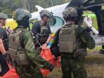 Ilustrasi-anggota-Koops-Habema-TNI-saat-mengevakuasi-jenazah-ke-helikopter-beberapa-waktu-lalu.jpg