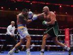 Jadwal-tinju-dunia-akan-saling-bertemu-Tyson-Fury-menghadapi-Oleksandr-Usyk.jpg