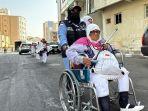 Jamaah-Haji-Pakai-Kursi-Roda-di-Mekah.jpg
