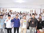 Kepala-OJK-NTT-Japarmen-Manalu-bersama-perwakilan-Bank-Syariah-Indonesia.jpg