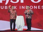 Menteri-Hukum-dan-HAM-Yasonna-Laoly-bersama-Direktur-Jenderal-Imigrasi-Silmy-Karim-launching.jpg