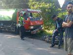 Olah-TKP-barang-bukti-mobil-tangki-air-dan-sepeda-motor.jpg