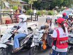 Pemerintah-Kabupaten-Sikka-melalu-BPBD-Sikka-dan-PMI-Sikka-membagikan-masker.jpg