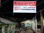 Pose-baliho-penolakan-yang-dipajang-di-jalan-masuk-MIN-TTU.jpg