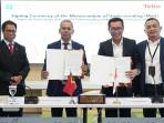 President-of-the-CTL-Board-dan-CEO-Telin-lakukan-penandatanganan-MOU-konoetivitas-digital.jpg