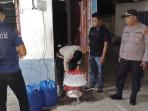Ratusan-liter-minuman-keras-jenis-moke-disita-polisi-di-Ende.jpg