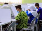 Siswa-kelas-8-mengikuti-Asesmen-Nasional-Berbasis-Komputer.jpg