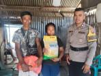 Sosok-Brigpol-Alam-Karunia-anggota-Polri-saat-membagikan-sembako.jpg