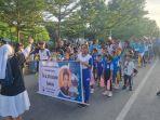Suasana-jalan-sehat-Canossa-Family-Gathering-2025-di-arena-CFD-Kupang.jpg