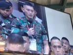 Terdakwa-saat-mengikuti-sidang-pembacaan-agenda-dan-mendengar-keterangan-saksi.jpg