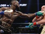 Tinju-Dunia-Dua-Kali-Kalah-dalam-Trilogi-Deontay-Wilder-Ingin-Duel-Keempat-dengan-Tyson-Fury.jpg
