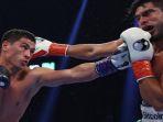 Tinju-Dunia-Kalahkan-Ramirez-Bivol-Pertahankan-Juara-tak-Terkalahkan-Rematch-dengan-Canelo.jpg
