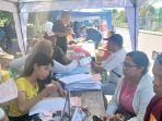 Warga-Kota-Kupang-sedang-memperoleh-layanan-pengurusan-NIB-di-car-free-day.jpg
