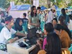 Warga-antusias-mengikuti-pemeriksaan-kesehatan-gratis-saat-car-free-day-CFD-di-Atambua.jpg
