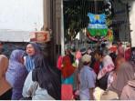 Warga-mengantre-di-gerbang-pendopo-Garut-menunggu-gelaran-makan-gratis.jpg