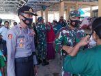 amm-bersama-tni-dan-polri-bagi-masker-untuk-masyarakat-reo.jpg