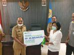 bpjamsostek-ntt-serahkan-lagi-santunan-kepada-pemerintah-kota-kupang.jpg