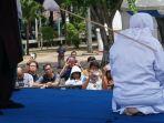 hukuman-cambuk-di-aceh.jpg