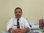 kepala-sekolah-smkn-2-kupang-silas-kase-spd-mt_20180404_203155.jpg