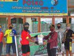 komunitas-kupang-cycling-club-bagikan-700-masker-gratis-di-lelogama.jpg