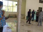 nampak-pansus-lkpj-bupati-sedang-melihat-kondisi-fisik-bangunan-puskesmas-panite.jpg