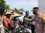 pembagian-masker-dan-penyemprotan-disinfektan-dalam.jpg