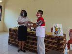 penyerahan-sumbangan-15-face-shield-dan-50-masker.jpg