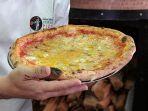pizza-yang-memecahkan-rekor-dunia-menggunakan-154-topping-keju.jpg