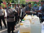 polres-kupang-kota-musnahkan-ribuan-liter-miras-lokal.jpg