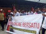 seusai-lakukan-demo-dan-berdialog-dengan-pemkot-kupang-grab-car-kembali-beroperasi.jpg