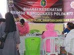 situasi-kegiatan-bhakti-kesehatan-brimob-dan-biddokes-polda-ntt_20181002_181330.jpg