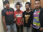 tersangka-jm-diapit-oleh-briptu-jacky-n-izach-bripda-petrus-kawangko-dan-briptu-charles-kote_20180510_153723.jpg