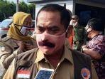 walikota-solo-fx-hadi-rudyatmo-memakai-masker-berkumis.jpg