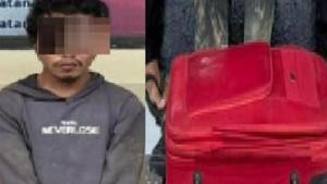 PEMBUNUHAN-Foto-pelaku-dan-koper-merah.jpg