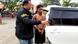 pelaku-pembacokan-di-Pringsewu-digiring-aparat-kepolisian.jpg