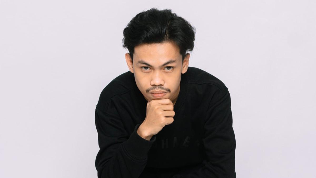 Alif-Naufal-Jasir-ketua-komunitas-Arsenal-Indonesia-Supporters-Lampung-memprediksi-Swiss-menang.jpg