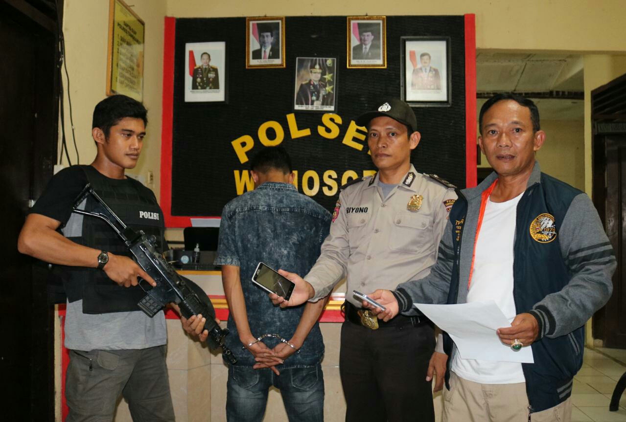 anggota-polsek-wonosobo-dan-polres-tanggamus-berhasil-meringkus-ahmad-sobari.jpg